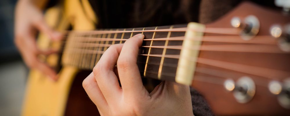 como ajustar alma guitarra